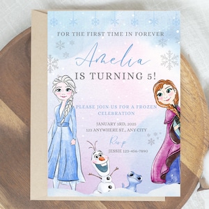 May include: Frozen themed birthday invitation with a watercolor background featuring Elsa, Anna, Olaf, and a small blue lizard. The invitation says "For the first time in forever Amelia is turning 5!" and includes the date, time, and location of the party.