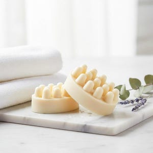 May include: A rustic wooden sign with the text "Welcome to our home" in white lettering. The sign has a distressed finish and a simple, inviting design, suitable for a porch or entryway.