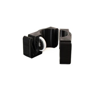 May include: A black, two-piece, 3D-printed cylindrical mount designed to secure a white Apple AirTag. The mount features a circular cutout for the tracker, a textured finish, and pre-drilled holes for mounting, providing a secure housing for the device.