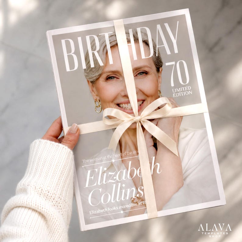 Puede incluir: Una portada de revista con el texto "BIRTHDAY 70 LIMITED EDITION" y el nombre "Elizabeth Collins". La portada est&aacute; envuelta con una cinta y un lazo de color crema. La imagen presenta a una mujer sonriente con cabello gris.