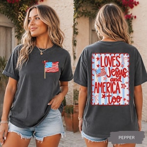 A woman wearing a black t-shirt with an American flag design and text on the back.