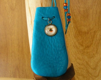 Fly, cerulean blue leather drawstring pouch with a glass charm, 3" x 1.5" adjustable 36" nylon neck cord