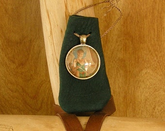 Green leather drawstring pouch with Fairy charm, adjustable drawstring neckcord, 3" x 1 1/2", talisman bag