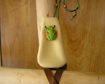 Frog, cream leather drawstring pouch with ceramic frog charm, 3.5" x 2.25" adjustable 36" green nylon neck cord and glass beads
