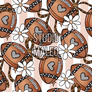 May include: A repeating pattern featuring brown American footballs with grey heart details, black and white dotted trim, and white daisies. The footballs are adorned with leopard print bows. The text "STUDIO MALEO" is visible.
