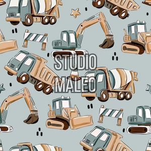May include: Seamless pattern featuring construction vehicles in shades of blue, brown, and tan on a light blue background. The design includes dump trucks, excavators, cement mixers, and road barriers. The text "STUDIO MALEO" is also visible.