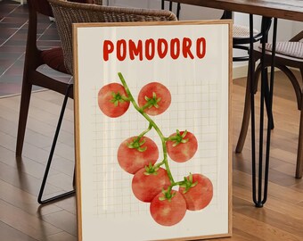 May include: A framed print with a watercolor illustration of a vine of red tomatoes. The print has a white background with a grid pattern and the word "POMODORO" in red letters at the top.