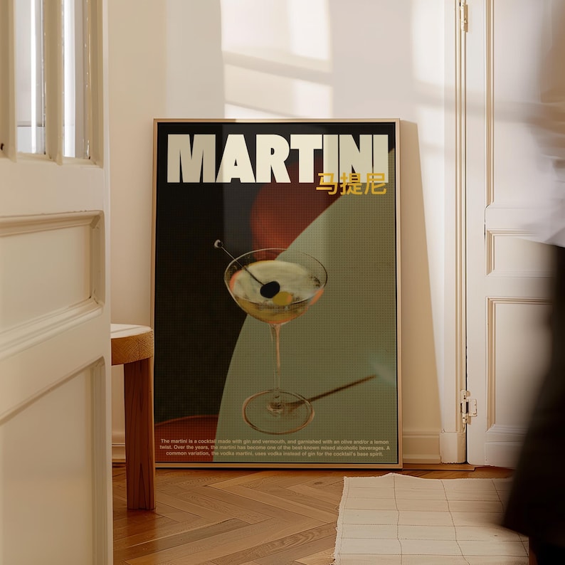 May include: A retro-style poster with the word "MARTINI" in bold white letters on a black background. The poster features a martini glass with a green olive and a gold straw. The text below the glass reads: "The martini is a cocktail made with gin and vermouth, and garnished with an olive or a lemon twist. Over the years, the martini has become one of the most popular cocktails in the world.  The most common variation is the "dry martini", which uses less vermouth than gin for the cocktail's base spirit."