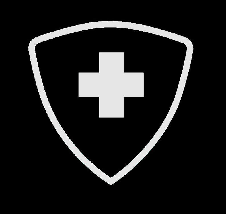 May include: A white shield with a white cross in the centre. The shield is a symbol of protection and safety.