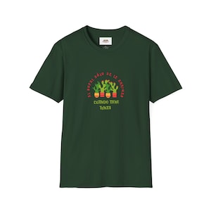 May include: A dark green t-shirt with a cactus graphic and the text "Al nopal solo se le arriman cuando tiene tunas".