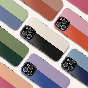May include: Assortment of phone cases with a two-tone color design. Each case features a different color combination, including green, orange, blue, pink, and purple.
