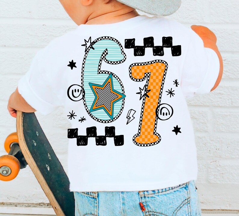 May include: White t-shirt featuring a vibrant '67' design. The number '6' is teal with a star, and the number '7' is orange. Black and white checkered patterns and star graphics surround the numbers. The shirt is worn by a person holding a skateboard.