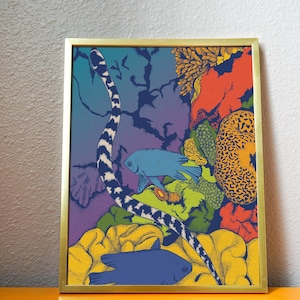 May include: A framed print depicting a colourful underwater scene with a black and white striped eel, blue fish, and coral. The background is a gradient of purple, blue, and green.