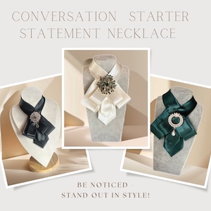 May include: Three statement necklaces in black, white, and emerald green, each with a decorative brooch. The necklaces are displayed on mannequins. The text reads "CONVERSATION STARTER STATEMENT NECKLACE" and "BE NOTICED - STAND OUT IN STYLE!"