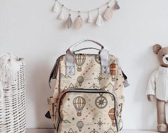 Mochila de pañales con temática de viaje: bolsa multifuncional para guardería