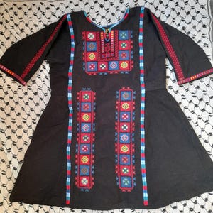 Baby Palestinian thobe embroidery (tatreez) pattern