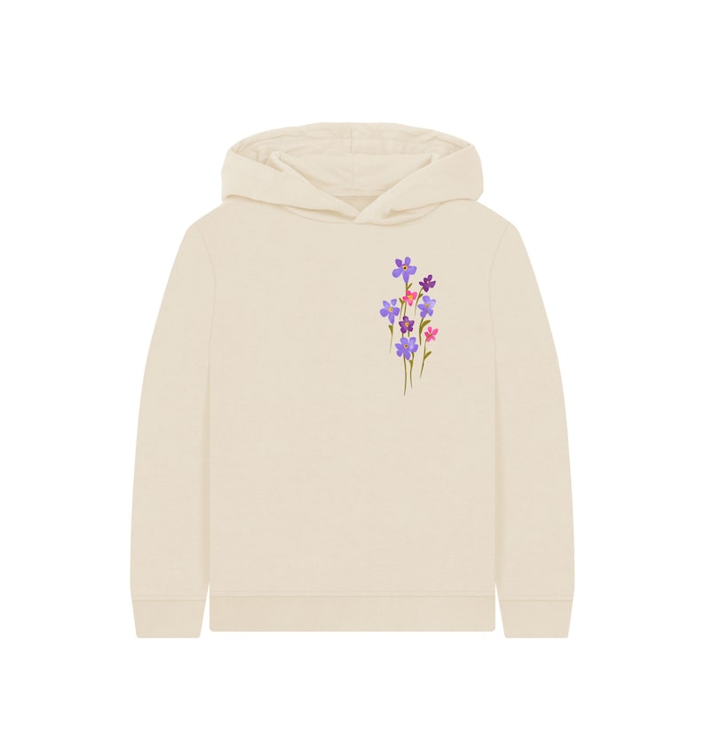 May include: A cream-colored hoodie with a floral design on the left chest. The flowers are purple, pink, and red. The hoodie has a hood and long sleeves. A casual, comfortable garment.