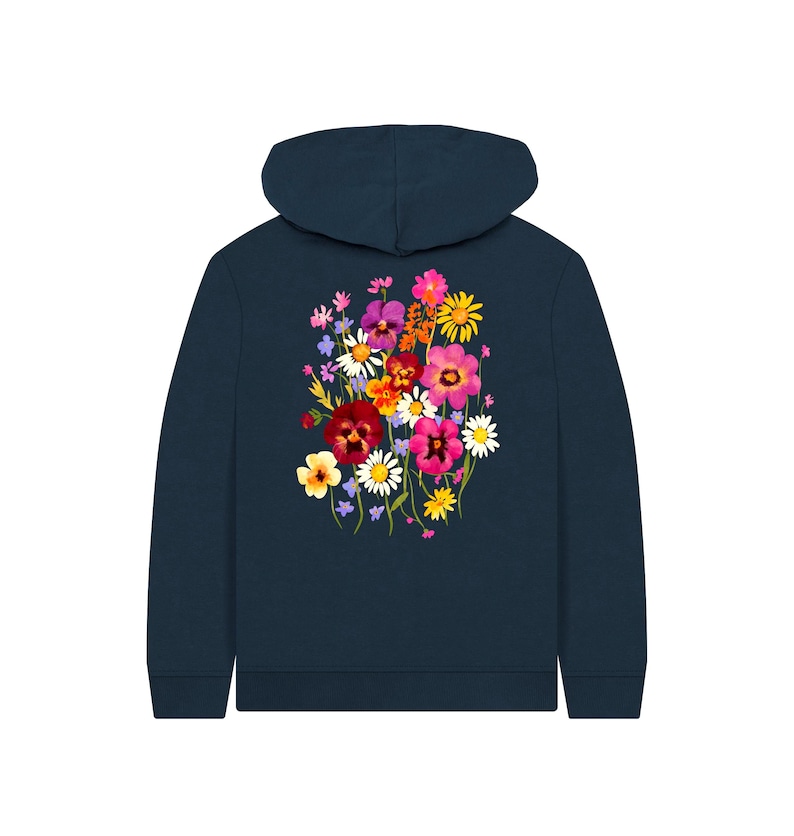 May include: Navy blue hoodie featuring a vibrant floral design on the back. The colorful bouquet includes pink, purple, yellow, and white flowers. The hoodie has a hood and a simple, classic design, suitable for casual wear.