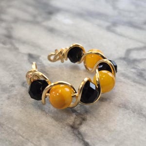 ハッフルパフ寮リング - ハリー・ポッター ホグワーツ ハンドメイドリング - 調節可能なフィジェットリング - 魔法の寮の誇りリング