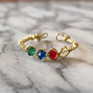 ホグワーツリング - ハリー・ポッター ホグワーツ ハンドメイドリング - 調節可能なフィジェットリング - 魔法の魔法使い寮プライドリング