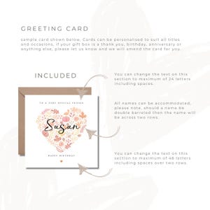 May include: A greeting card with a heart-shaped floral design in shades of peach, orange, and cream. The name "Susan" is written in elegant script within the heart. The card reads "To a very special friend" and "Happy Birthday".