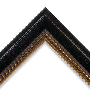 May include: Close-up of a corner of a black picture frame with a gold inner edge. The frame has a distressed finish, with visible wear and tear. The gold edge features a repeating pattern of small, rounded details.