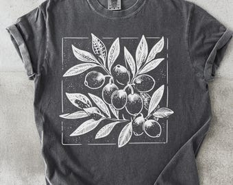 Camiseta Rama de Olivo: Camiseta con estampado botánico, diseño minimalista.