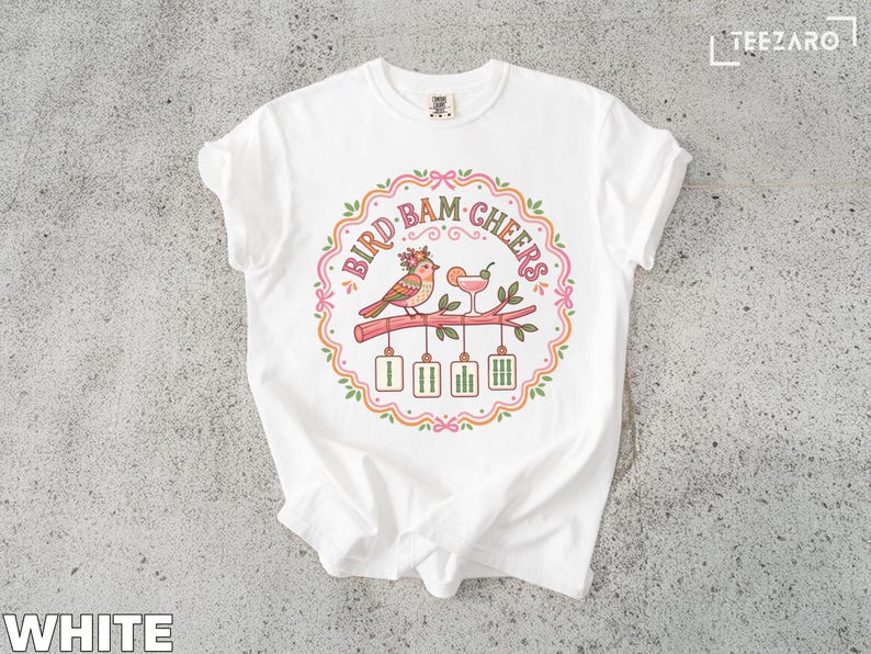 T-shirt with "Bird Bam Cheers" text and two birds toasting with cocktails.