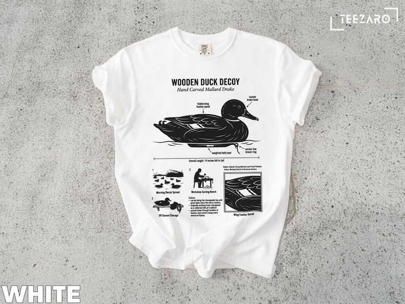White t-shirt featuring a diagram of a wooden mallard duck decoy.