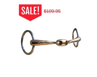 May include: A silver and gold horse bit with a loose ring on each end. The bit has a small, round, gold centre piece.  SALE! £89.95