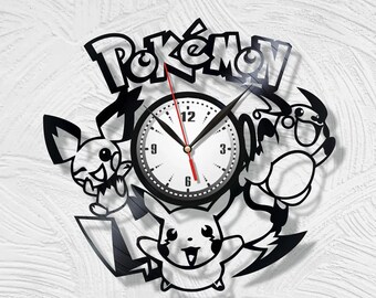 May include: Black and white Pokémon-themed wall clock. The clock features a white clock face with black numbers and hands, and a red second hand. The clock is surrounded by Pokémon characters and the word "Pokémon".