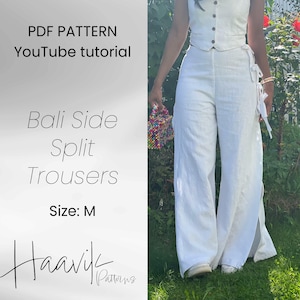 May include: White linen pants with a side split and a tie detail at the waist. The pants are part of a sewing pattern called "Bali Side Split Trousers" in size M. The pattern is available as a PDF download with a YouTube tutorial. The text "Haavik Patterns" is also visible.