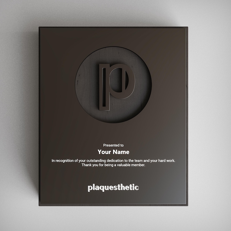 May include: A dark brown plaque with a circular inset featuring the letter "P". The plaque includes the text "Presented to Your Name" and a message of appreciation. The word "plaquesthetic" is at the bottom.