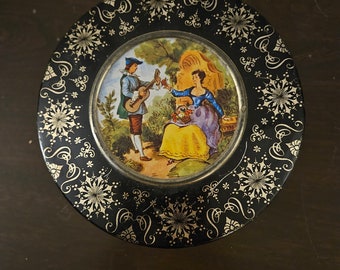 Vintage 8” round Tin Atlantic Can Co Victorian Couple Scene