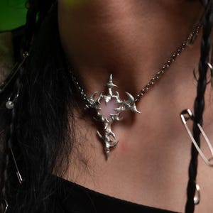 Spiky Sword Pink Heart Pendant Necklace: Cyber Goth Y2K Jewelry