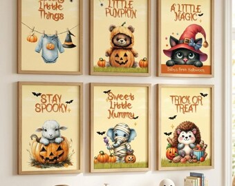 May include: A set of six framed wall art prints featuring Halloween-themed illustrations of animals and baby clothes. The prints include text such as Spooky Little Things, Little Pumpkin, A Little Magic, Stay Spooky, Sweet Little Mummy, and Trick or Treat.