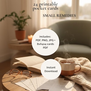 May include: A warm, inviting image of a wooden table with printable pocket cards, a cup of tea, and a book. The cards are labelled "Small Remedies" and "Instant Download". A pair of glasses rests on the table, creating a relaxing atmosphere.