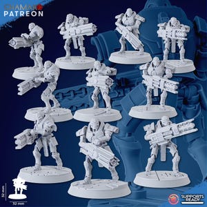 May include: A collection of white miniature robot figures, each holding a large weapon. The figures are on circular or square bases. The image includes the text "CHAMAK PATREON" and "SUPPORTS READY". The figures are approximately 32 mm in height.