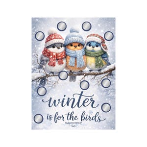 May include: A whimsical illustration features three birds perched on a snow-covered branch. Each bird wears a winter hat and scarf in red, blue, and green. The text "winter is for the birds" is displayed in cursive script, surrounded by silver circles.