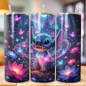 May include: A set of three stainless steel tumblers featuring a vibrant illustration of Stitch from Lilo & Stitch. The design includes a nighttime forest scene with a castle, butterflies, and glowing flowers in shades of blue, purple, and pink. Each tumbler has a clear straw.