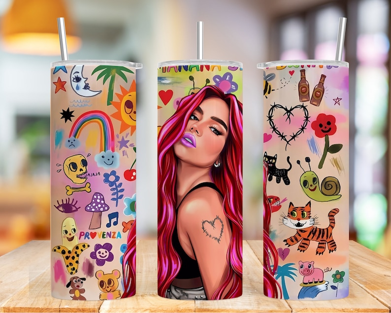 K&ouml;nnte beinhalten: Drei Edelstahlbecher mit unterschiedlichen Designs. Der erste Becher hat ein farbenfrohes Design mit einem Regenbogen, einem Sch&auml;del, einem Pilz und dem Wort "Provenza". Der zweite Becher hat ein Portr&auml;t einer Frau mit pinkem Haar. Der dritte Becher hat ein farbenfrohes Design mit einem Herzen, einer Katze, einer Schnecke, einem Tiger und einem Schwein.