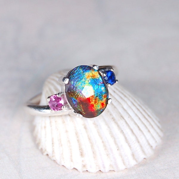 Ammolite ring."Candles Behind a Church Stained Glass Window".Natural Sapphires.