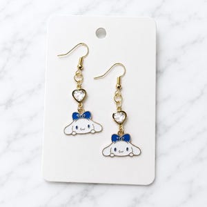 Handmade character charm earrings with optional heart charm color and stainless steel hooks, Handmade Stainless Steel Cinnamoroll Earrings, Cinnamoroll Jewelry, Cinnamoroll Accessories, Cinnamoroll Dangle Earrings, Sanrio Earrings, Handmade Stainless Steel Cinnamoroll Earrings, Cinnamoroll Jewelry, Cinnamoroll Accessories, Cinnamoroll Dangle Earrings, Sanrio Earrings