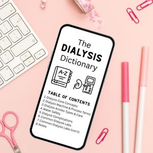 May include: A smartphone showing "The Dialysis Dictionary" with a table of contents on a pink surface. The image includes a keyboard, pink scissors, pens, paper clips, and decorative tape, suggesting a study or work environment.