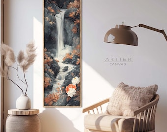 May include: A vertical canvas print featuring a watercolor painting of a waterfall cascading down a rocky cliffside. The painting is framed in a thin, wooden frame and features a muted color palette of blues, greens, and browns. The waterfall is surrounded by lush foliage and delicate flowers in shades of pink and orange.