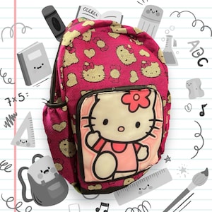 May include: Pink Hello Kitty backpack with a large Hello Kitty character on the front pocket. The backpack has a pink and white floral pattern with hearts and Hello Kitty faces.