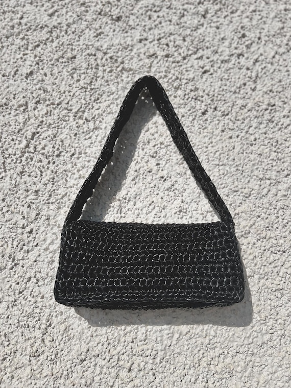 black faux leather shoulder bag