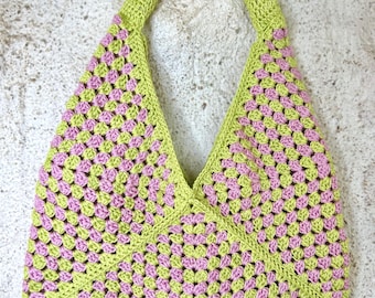 Green and pink handbag