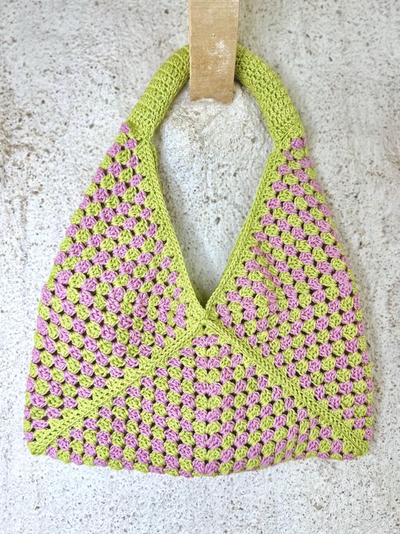 Green and pink handbag