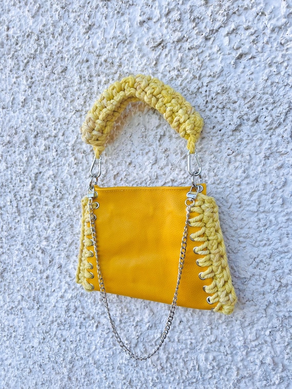 Yellow rope and leather bag